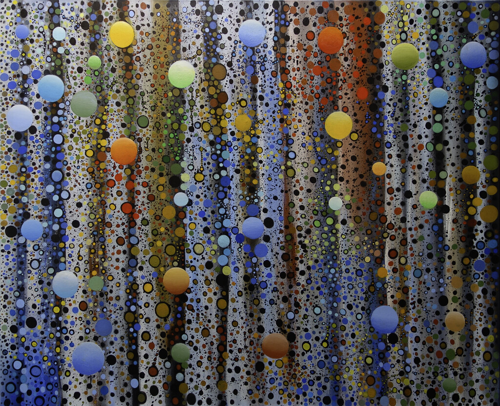 Spheres Emerging out of a Wavy Background